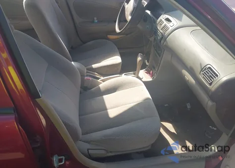 2000 Toyota Corolla Ce z USA, uszkodzony, nr VIN 2T1BR12E4YC314748